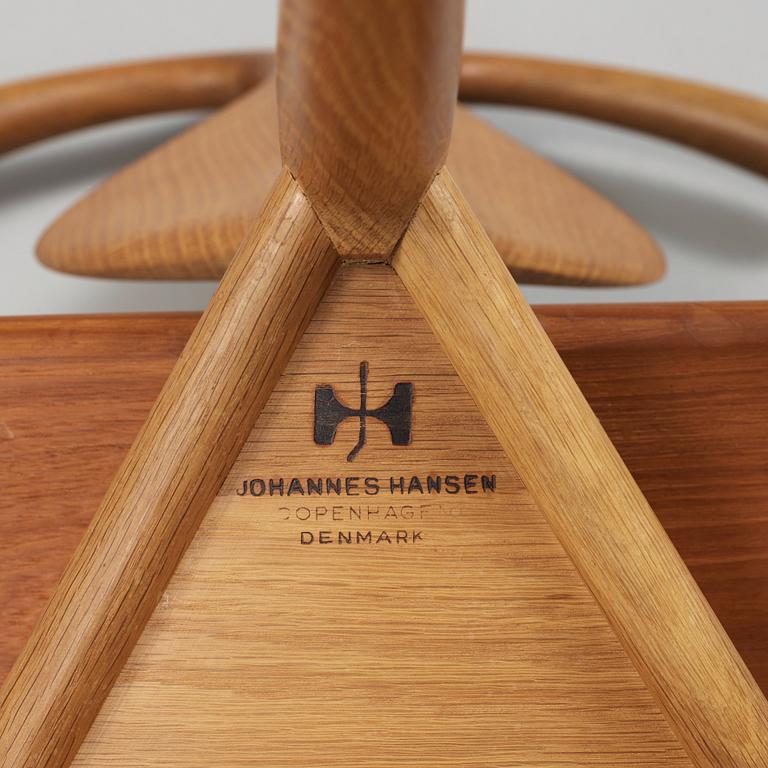A Hans J Wegner 'Jakkens Hvile' teak chair, Johannes Hansen, Denmark.
