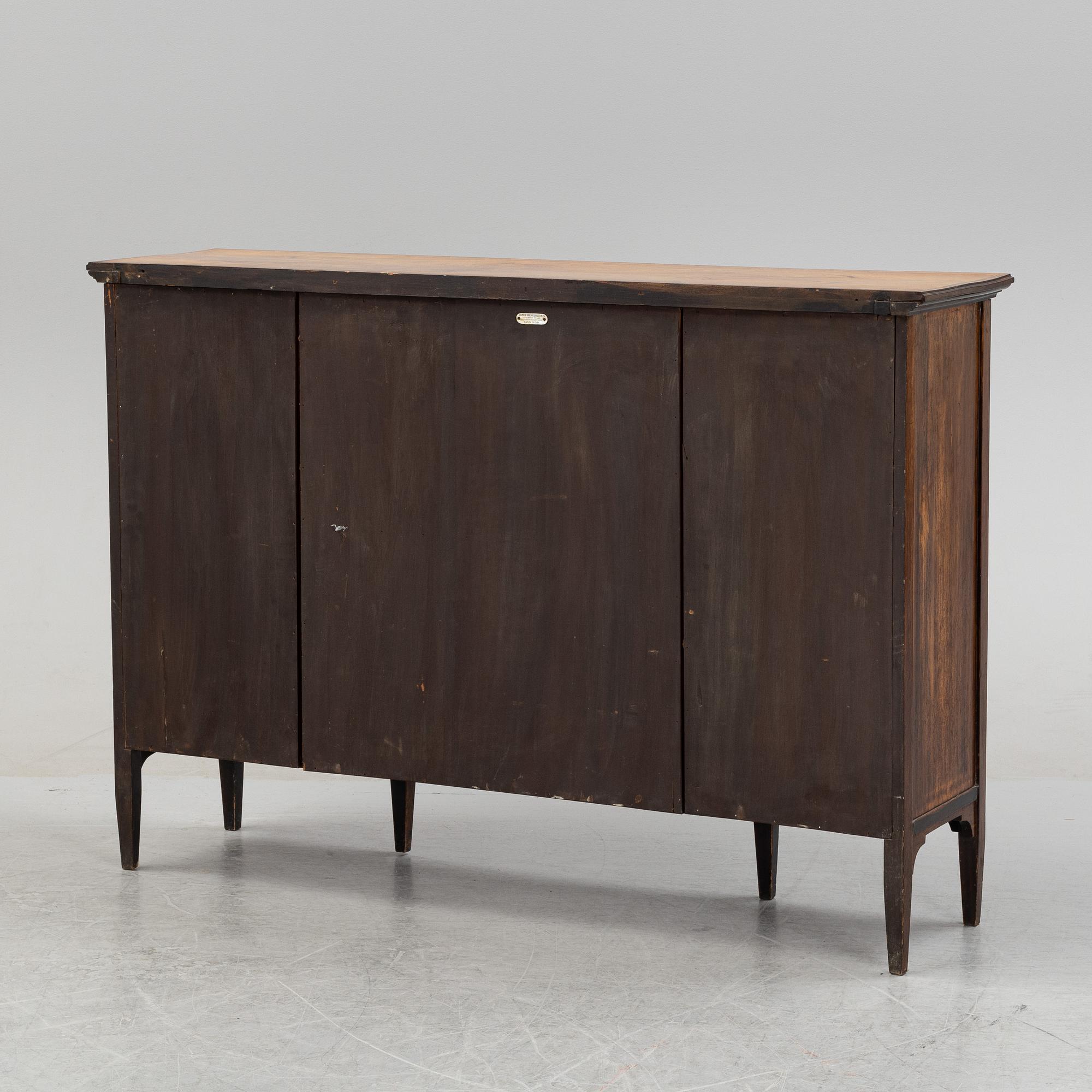 A rosewood veneered sideboard by James Shoolbred & Co, London, circa 1900.