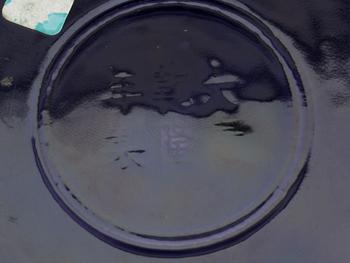 A pair of deep purple glazed dishes, Qing dynasty, with Qianlong six character mark.