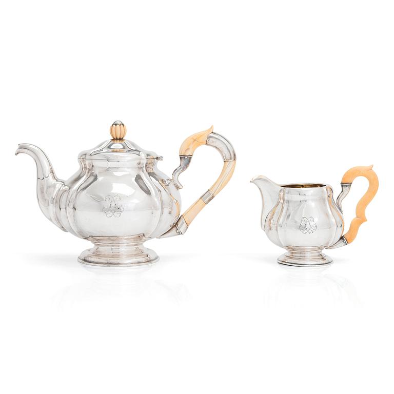 Polish silver teapot and milk jug, maker's mark of Karol Filip Malcz, Warsaw, mid-19th century.