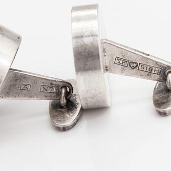 Elis Kauppi, A pair of silver cufflinks with tiger's eye. Kupittaan kulta, Turku 1966.