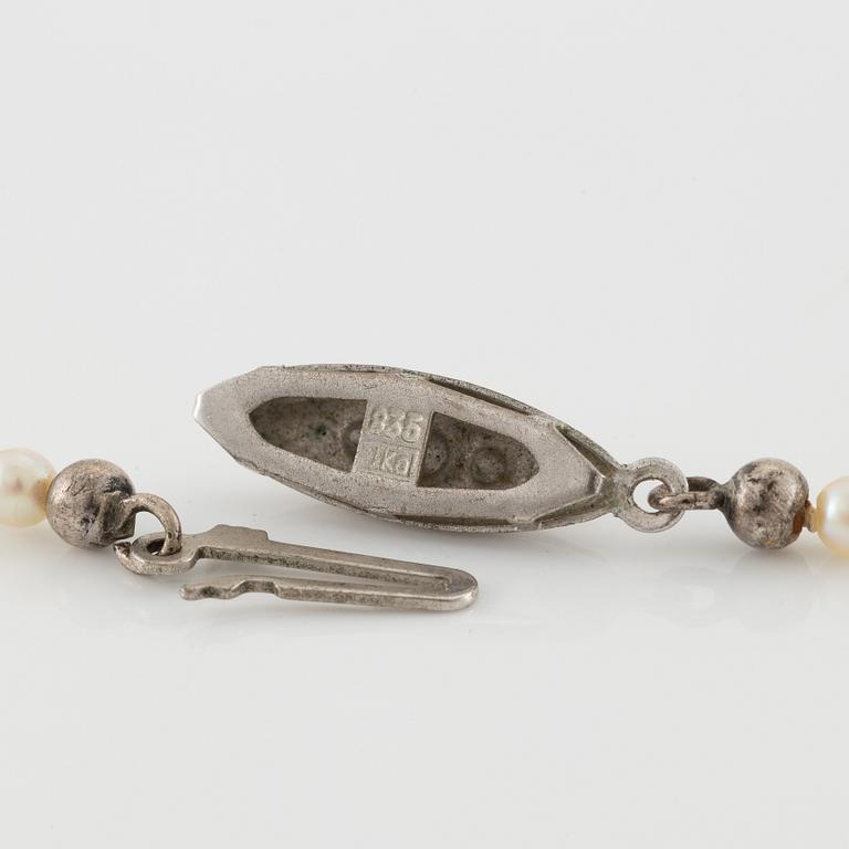 Pearl necklace, graduated pearls, clasp silver with pyrite.