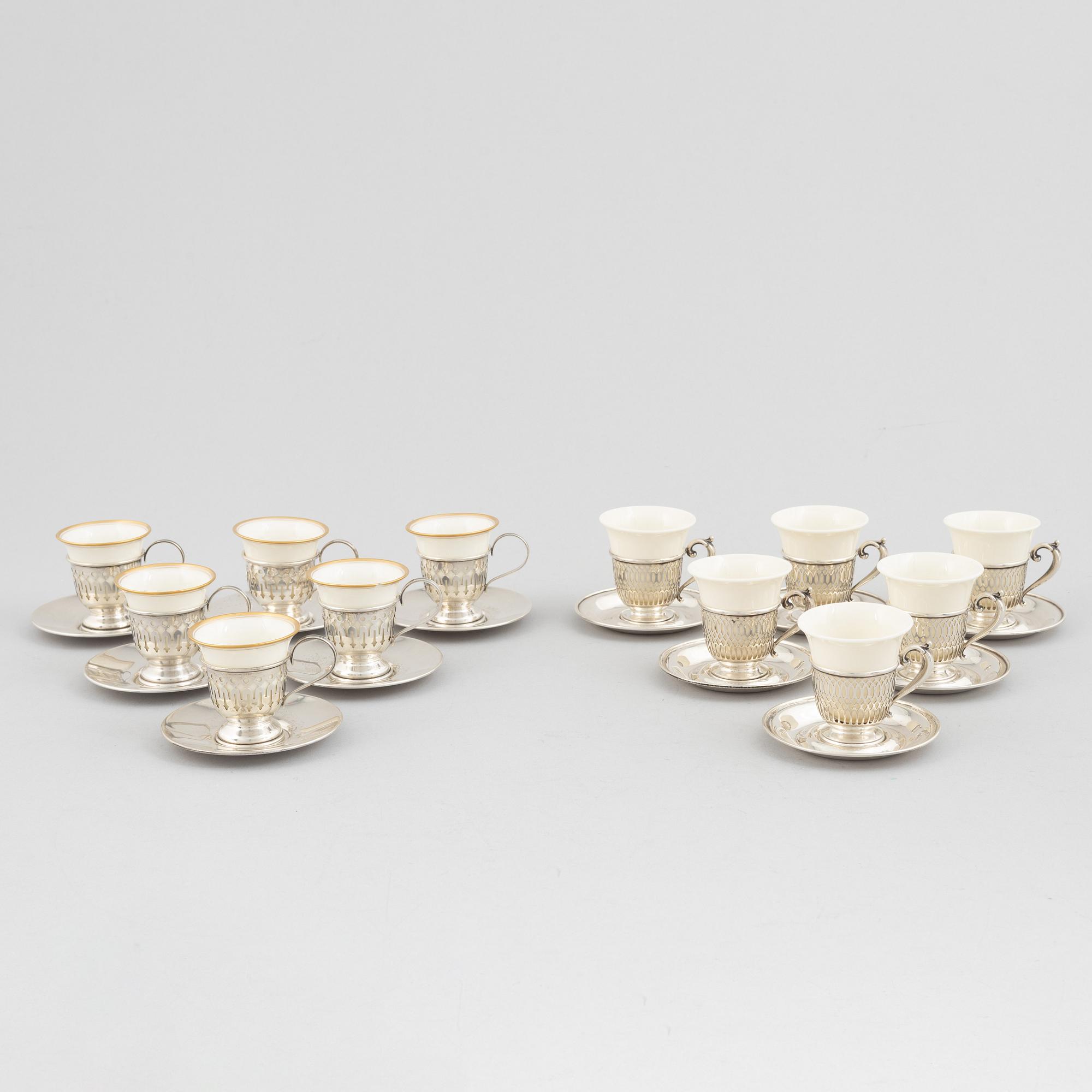 Kopphållare med fat, 6+6 st, sterlingsilver och porslin, bl.a. John Wanamaker, Philidelphia, USA, tidigt 1900-tal.