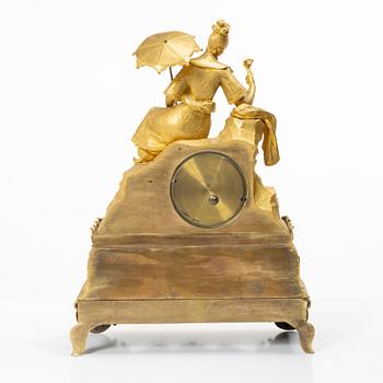 A Late Empire table clock, 19th century.