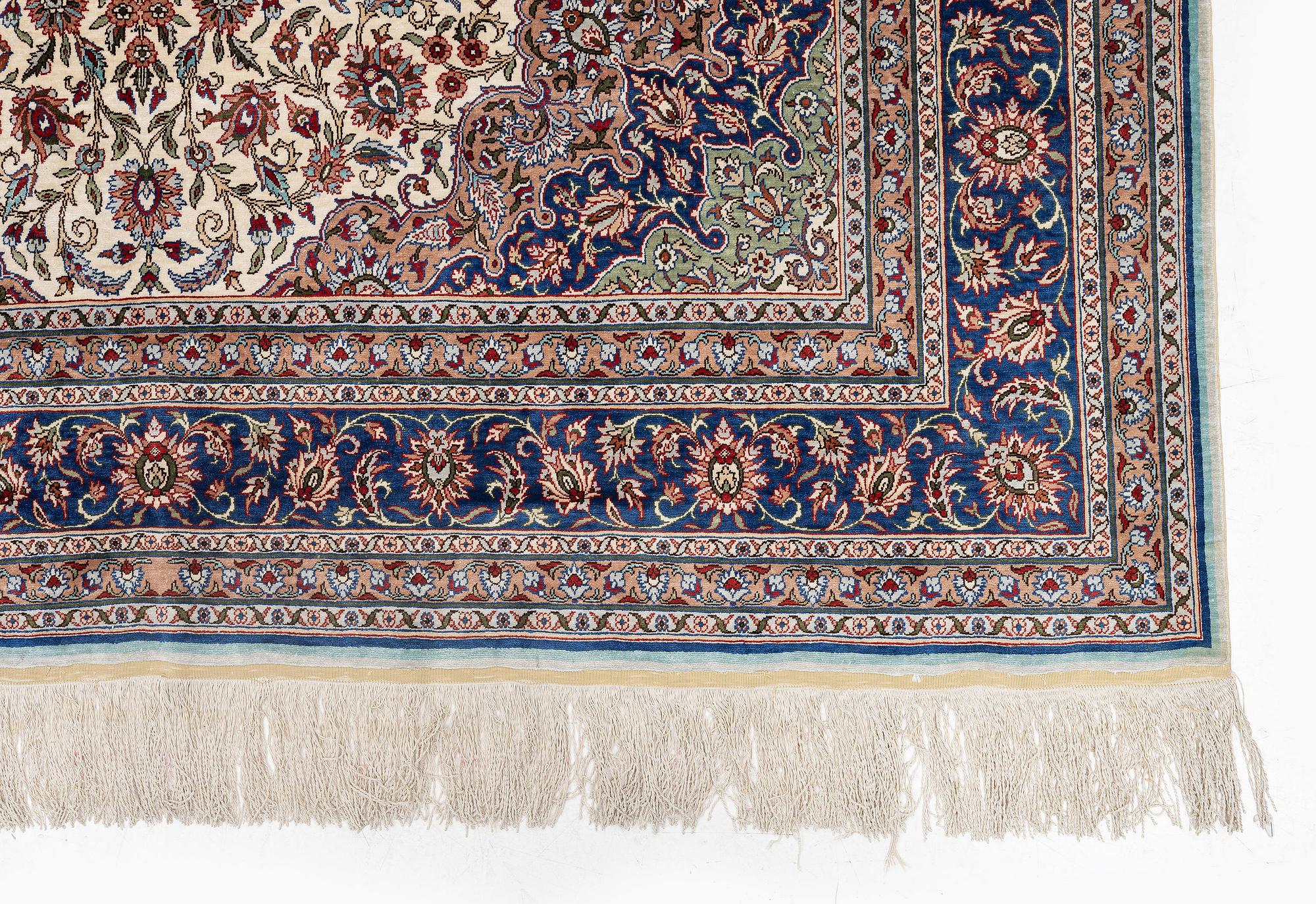 A silk Kayseri/Hereke carpet, c. 310 x 195 cm.