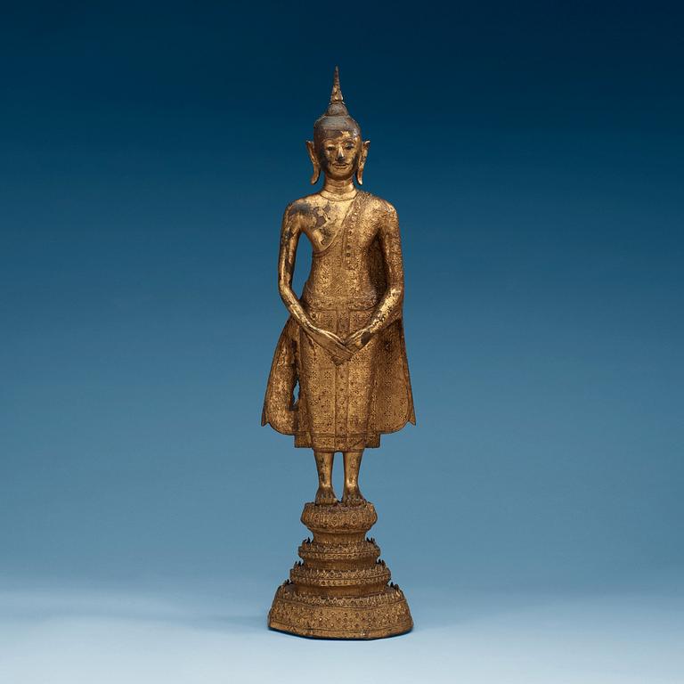 A painted bronze figure of Buddha, Thailand, circa 1900.