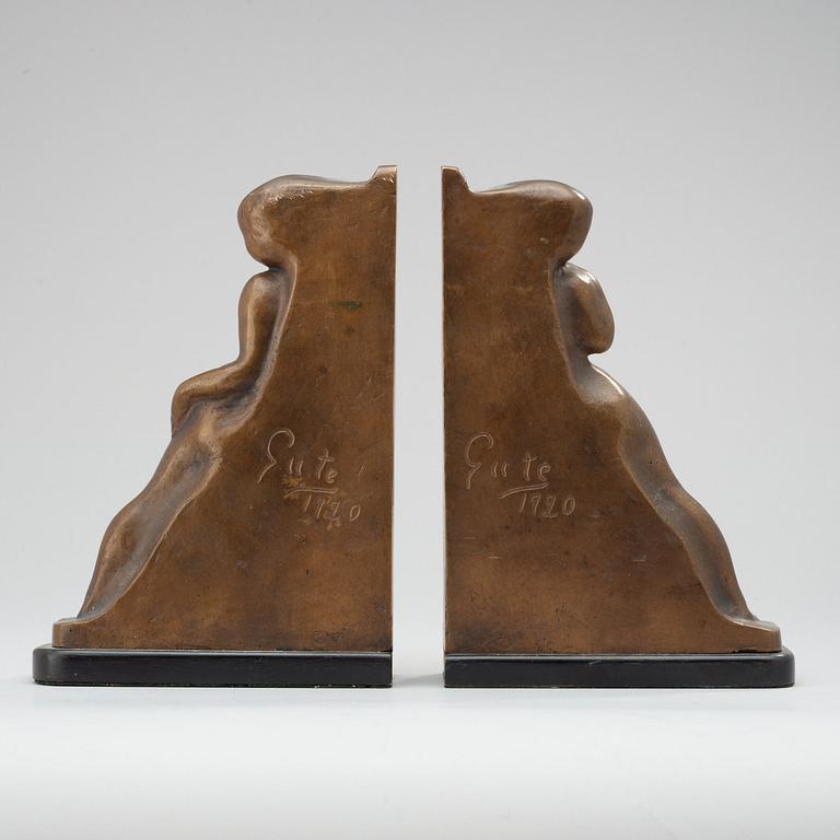 A pair of Axel Gute bronze bookends, Stockholm 1920.