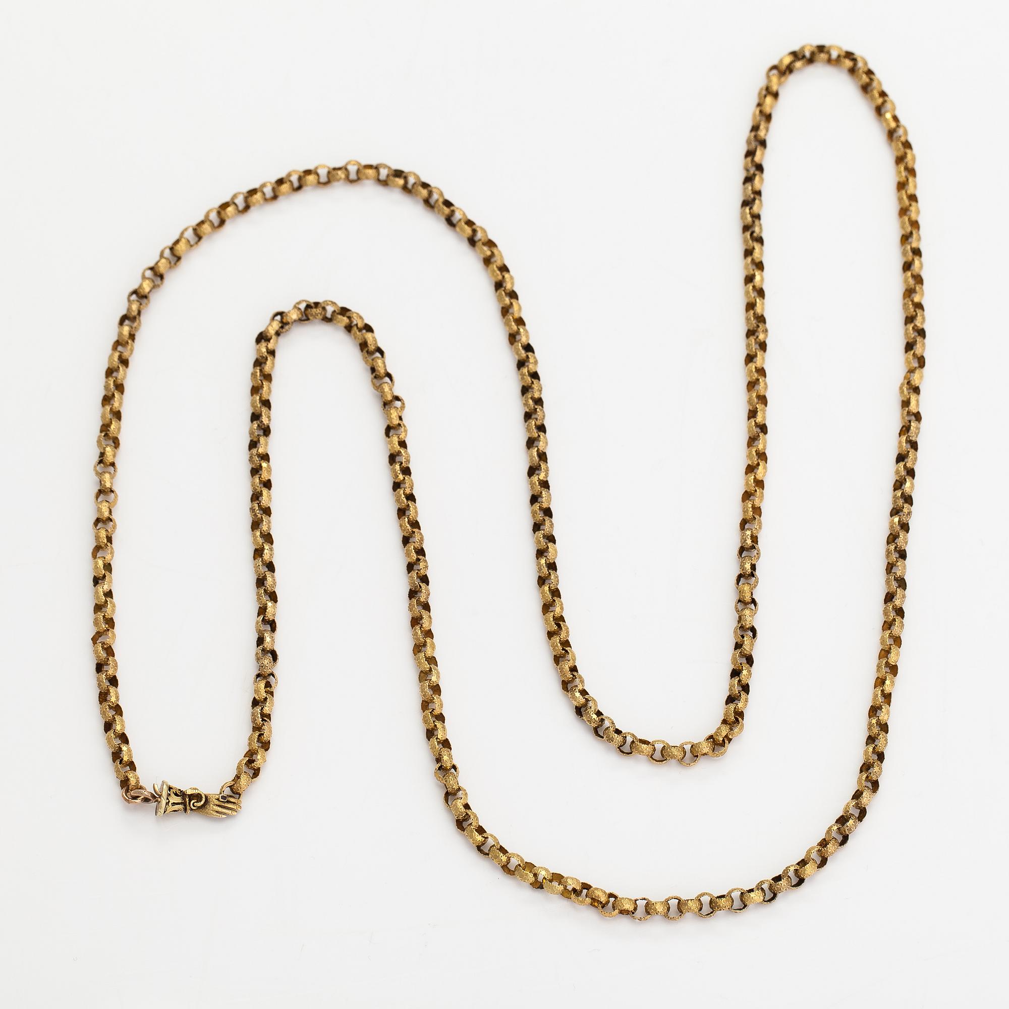 Halsband, 18K guld och syntetisk eller äkta rubin.
