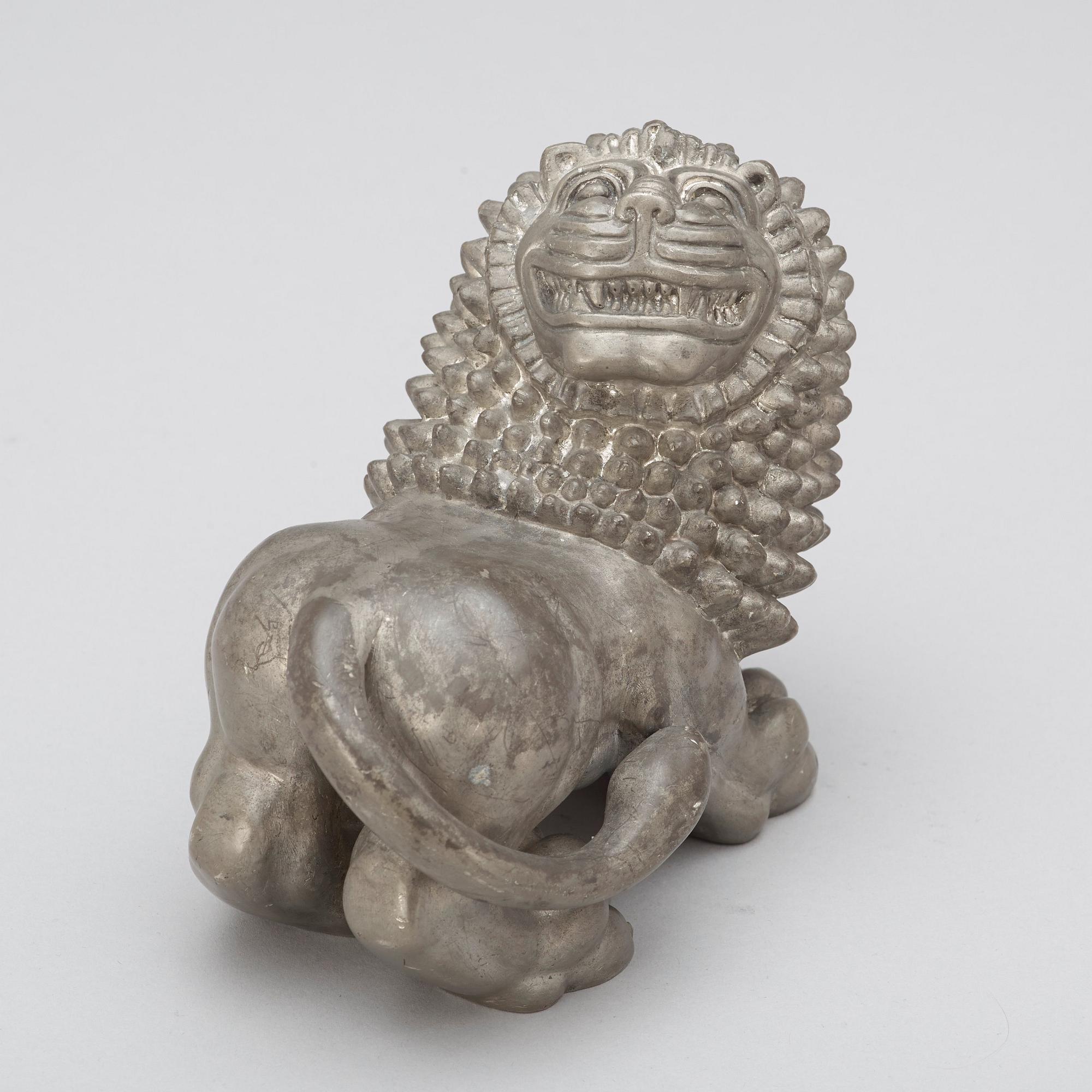 An Anna Petrus pewter sculpture of a lion, Svenskt Tenn, Stockholm 1920's-30's.