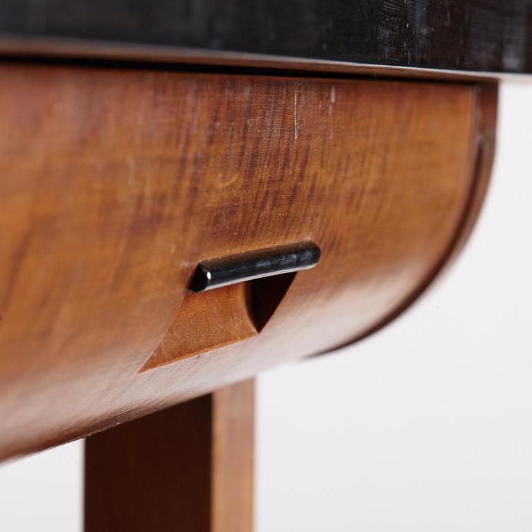 Hjalmar Jackson, A Hjalmar Jackson ebony and pearwood desk/library table, Stockholm ca 1934.