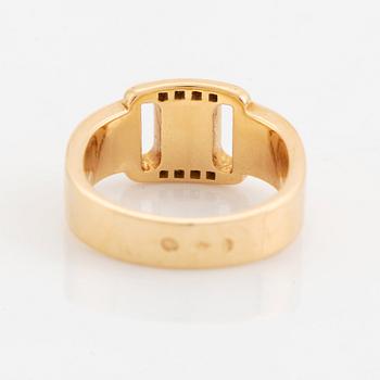 Hermès 18K gold ring set with round and brilliant-cut diamonds.