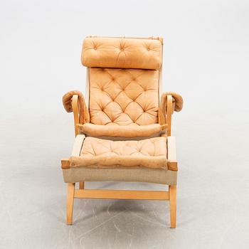 Bruno Mathsson, Armchair with footstool, "Pernilla", DUX, late 20th century.