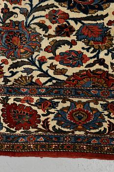 A carpet, semi-antique, ca 314,5 x 218 cm.