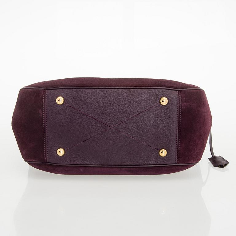 Louis Vuitton, a Monogram Empreinte 'Audacieuse' bag.
