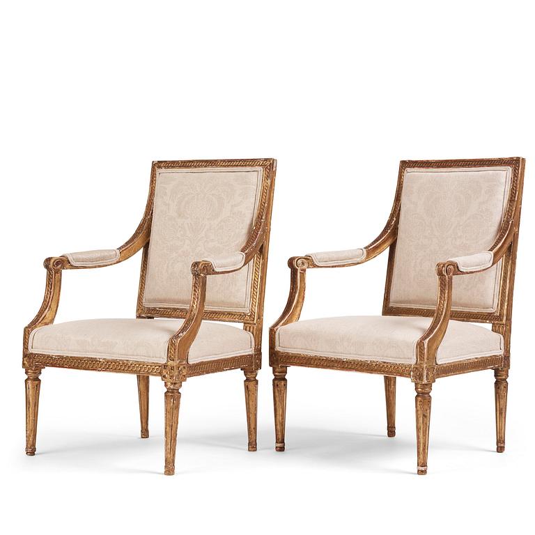 A near pair of Gustavian giltwood fauteuils, Stockholm, late 18th century.