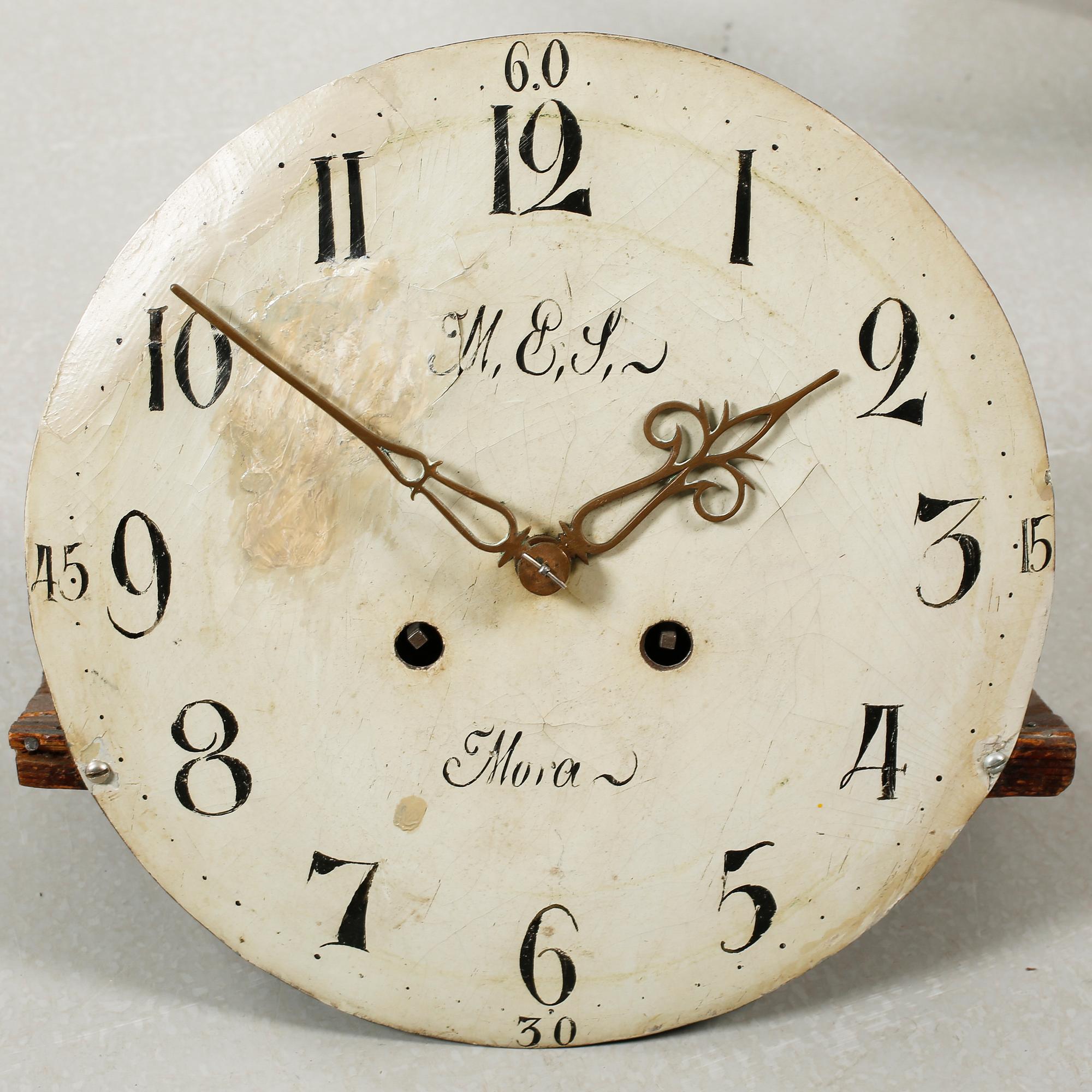 A grandfather clock dated 1823.