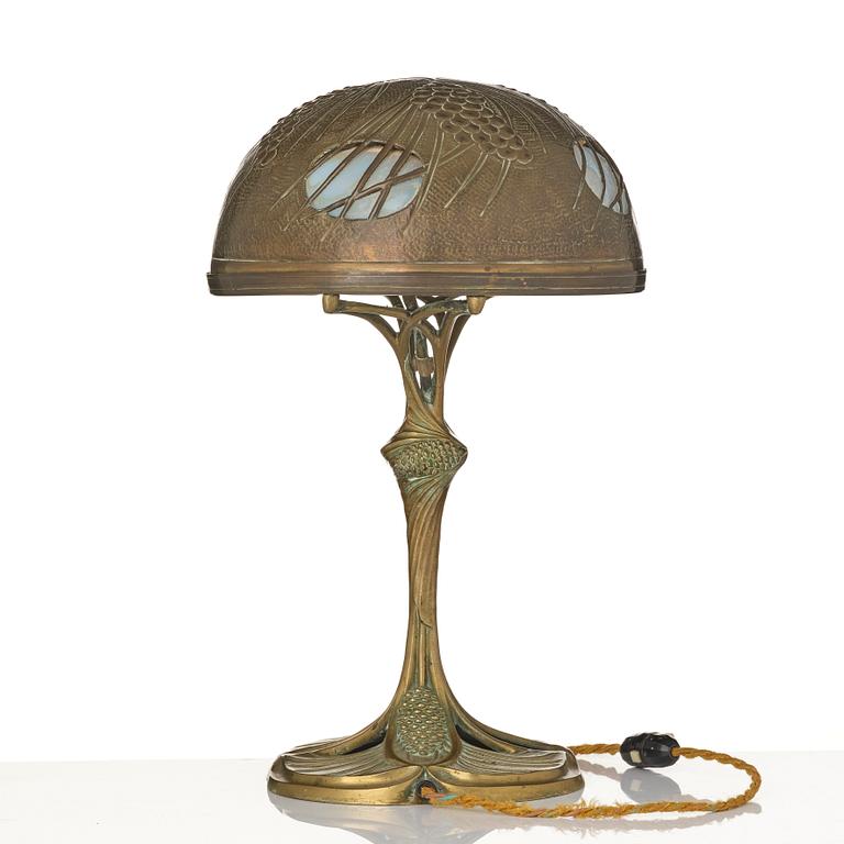 A bronze and brass table lamp, with signature Georges Leleu.