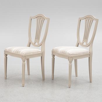 A Gustavian Style Dining Table and 10 Chairs, second half of the 20th Century.