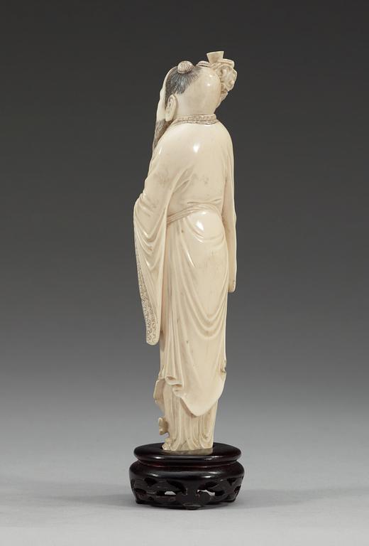 A ivory figure of (Han) Zhongli Quan, Qing dynasty, circa 1900.