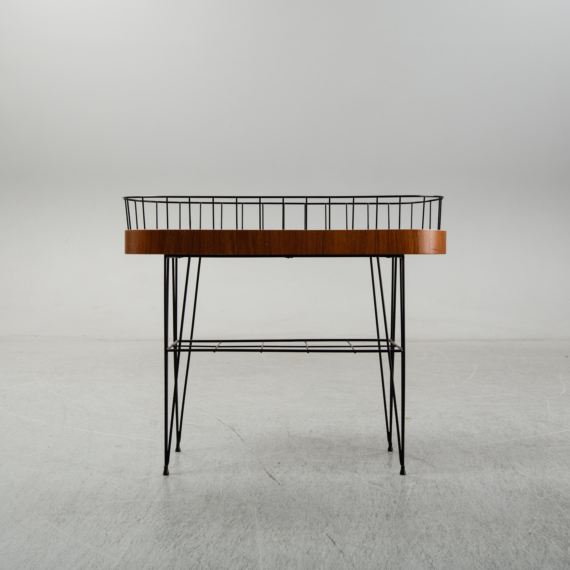 A 1950-60s plant stand.