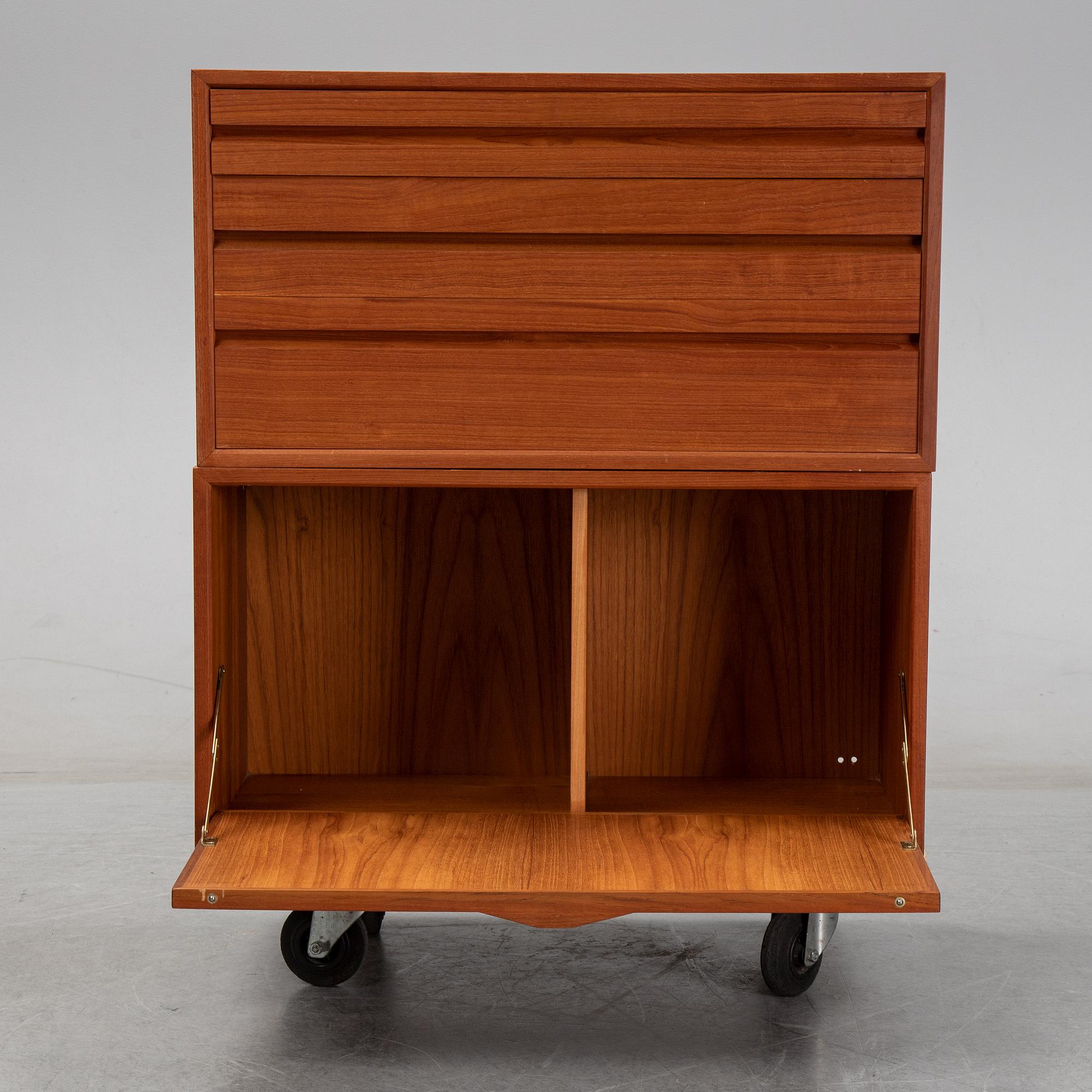 A 1960's teak shelving system by Poul Cadovius.