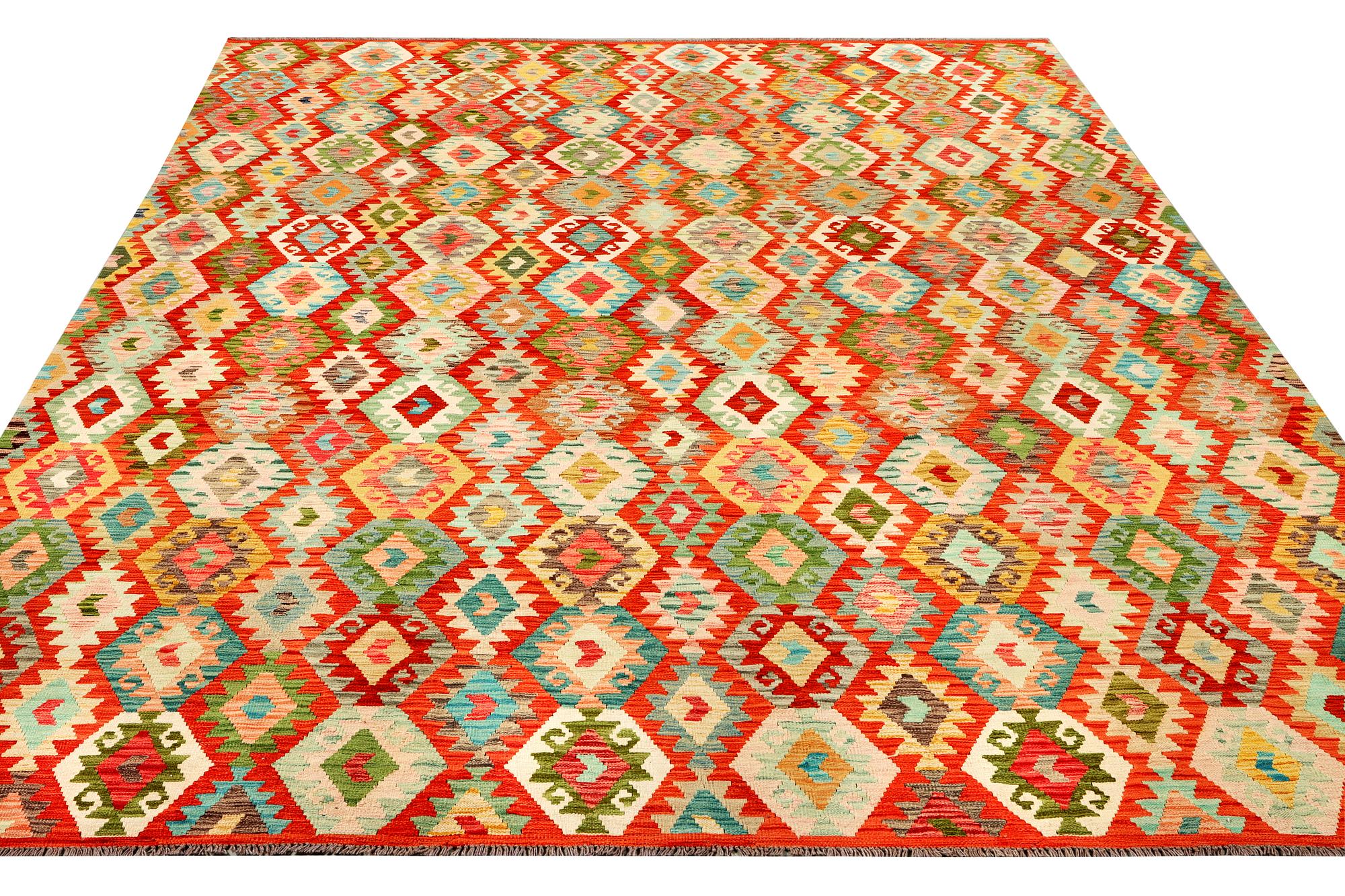 A Kilim carpet, c. 396 x 307 cm.