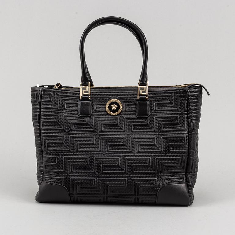 Versace, a black quilted leather handbag.