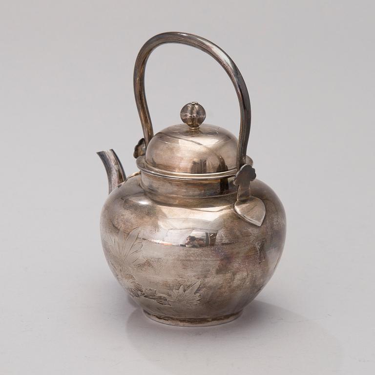 A Korean Silver Tea Pot.