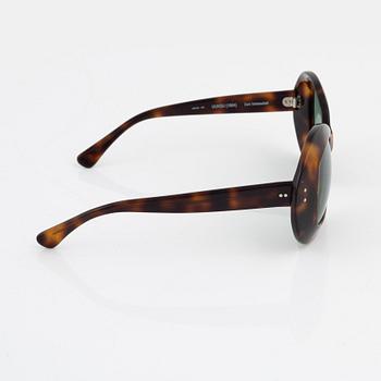 Oliver Goldsmith, a pair of "Uuksu" sunglasses.