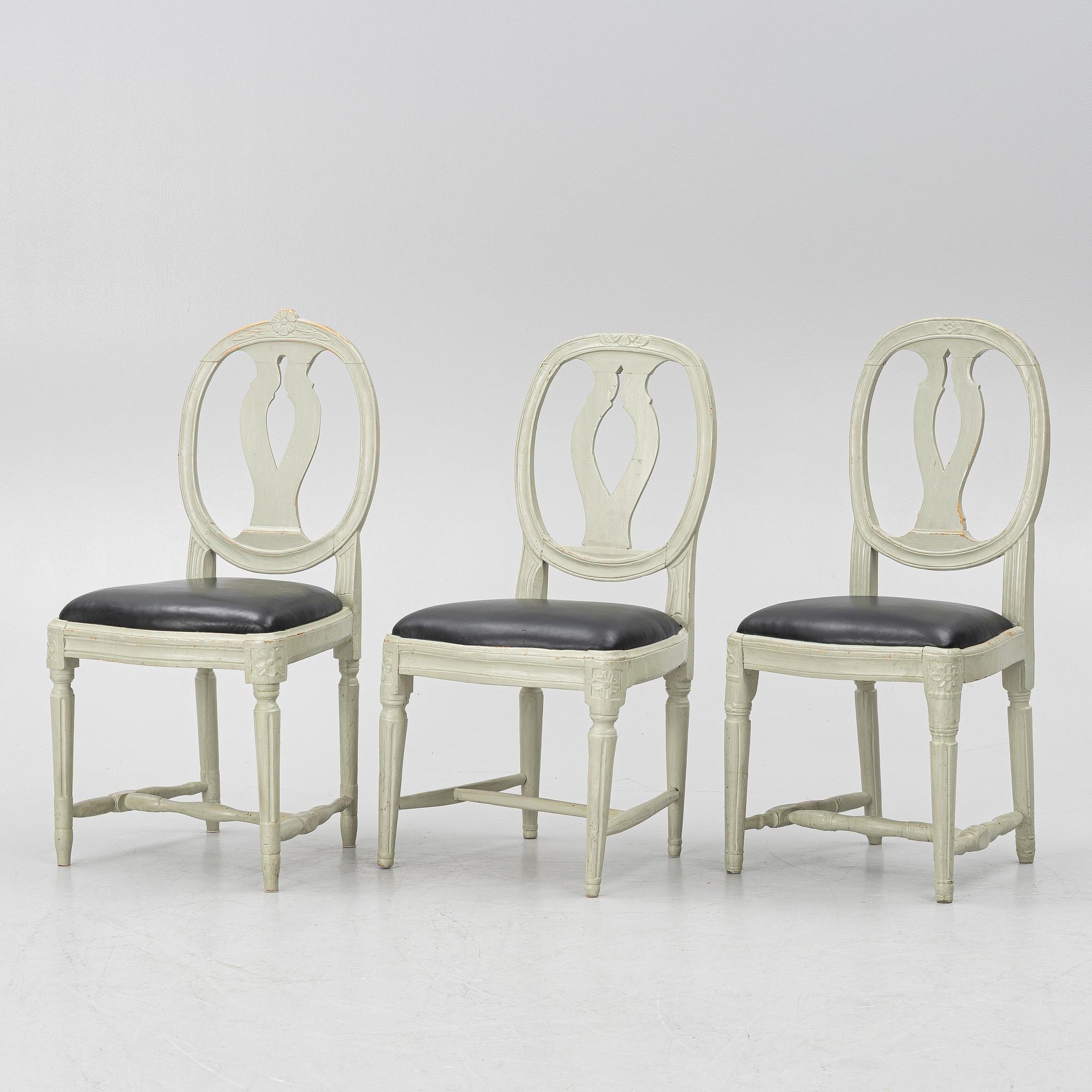 Ten similar Gustavian chairs, Sweden, around the year 1800.