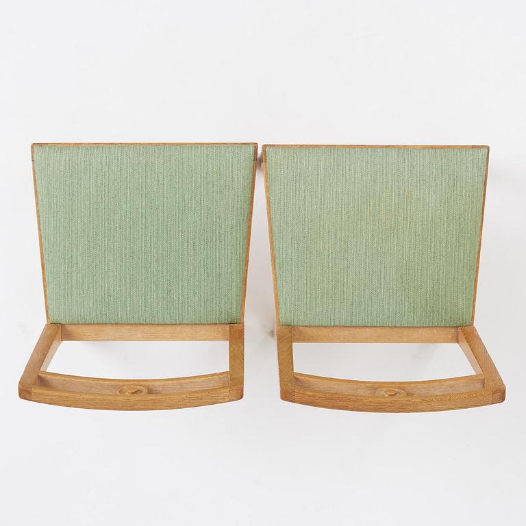 Axel Einar Hjorth, a pair of oak "Dagmar" chairs, Nordiska Kompaniet, Sweden, 1937.