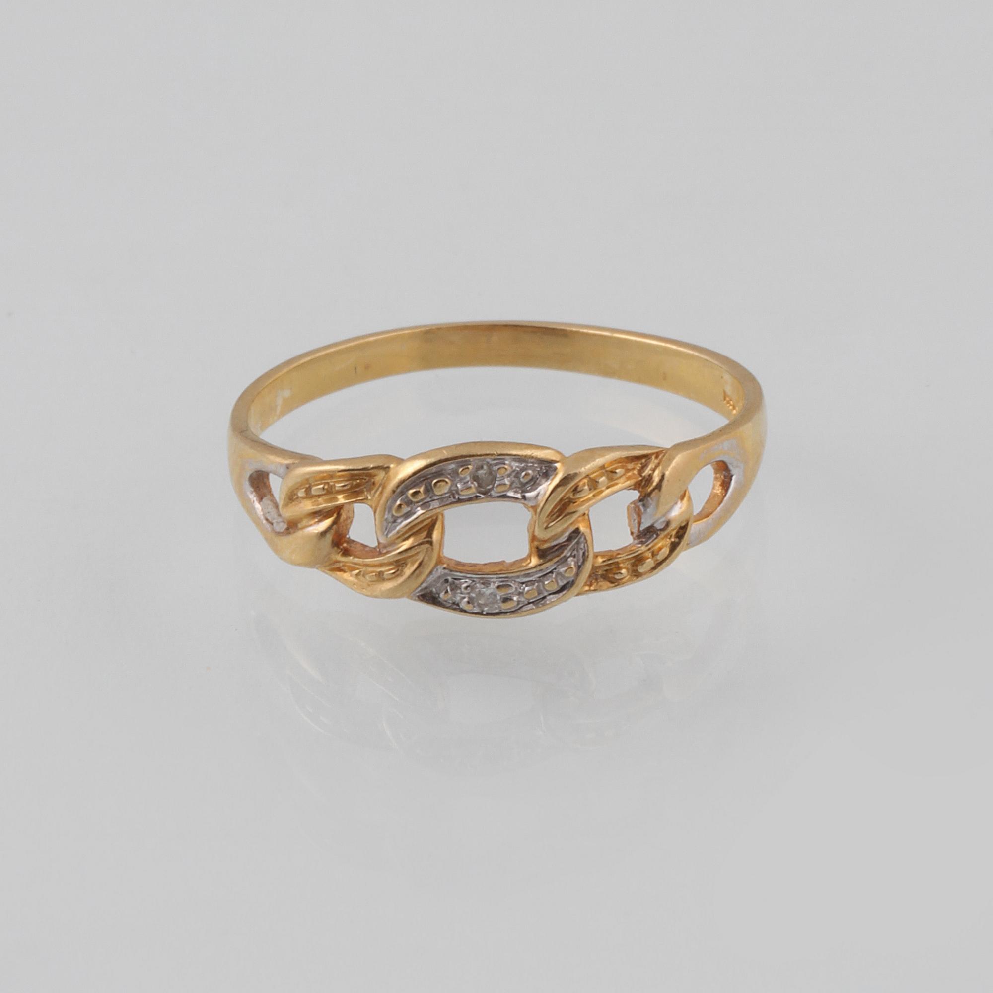 RING, 18K guld och vitguld med 2 åttkantslipade diamanter, Kattfotstämplad. Vikt 1,8 gram.