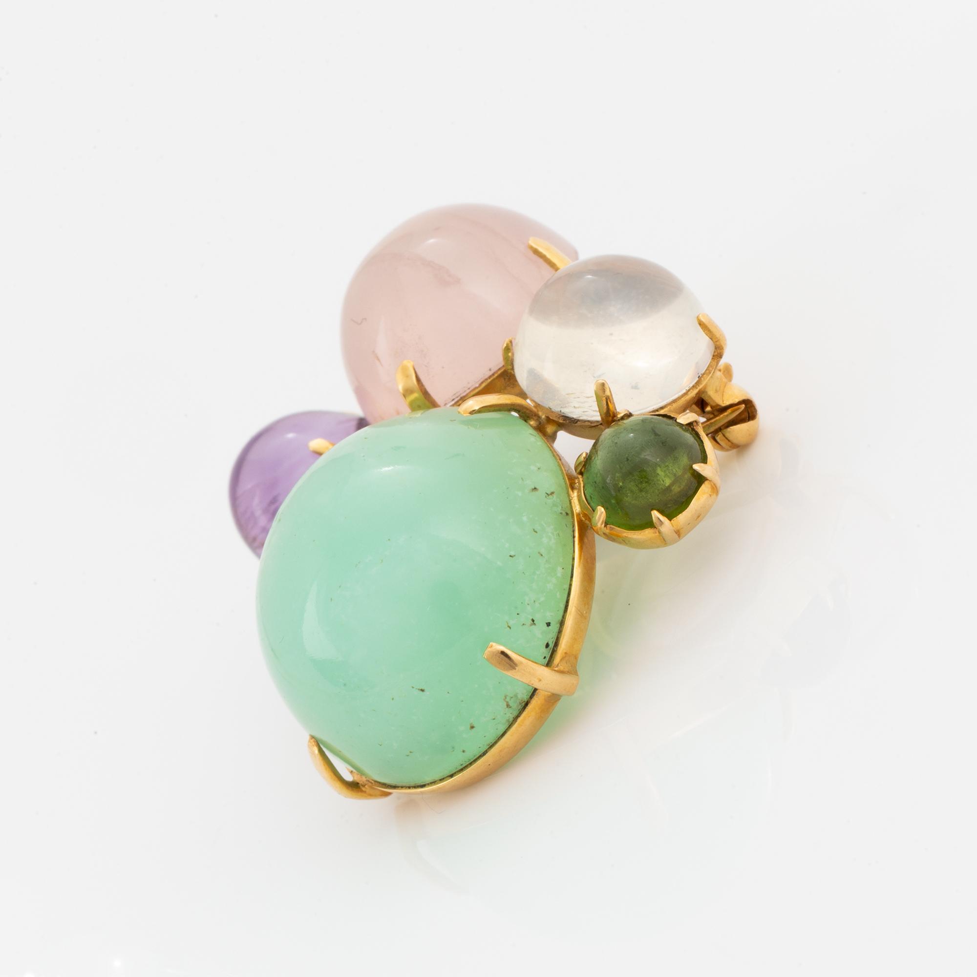 Brosch, guld med  cabochonslipade färgstenar.