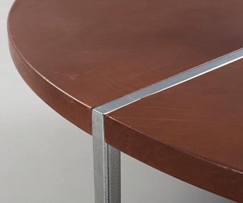 A Walter Knoll dining table with brown leather top, Germany.