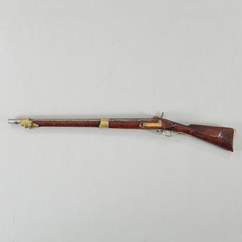 A percussion rifle, remade from flintlock rifle m/1820.