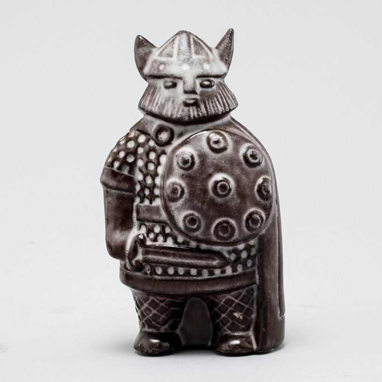 Eight stoneware figurines by Uppsala-Ekeby, from the latter half of the 20th century.