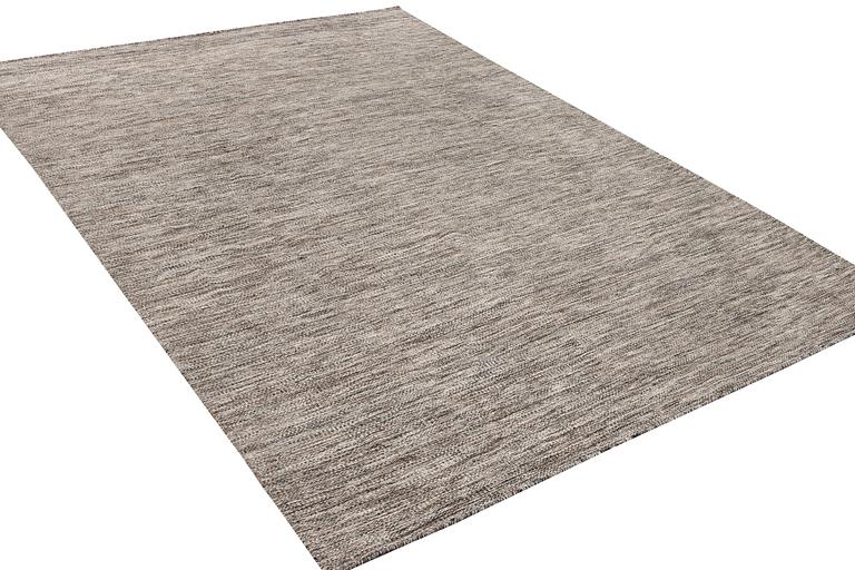 A flat weave carpet, c. 337 x 328 cm.