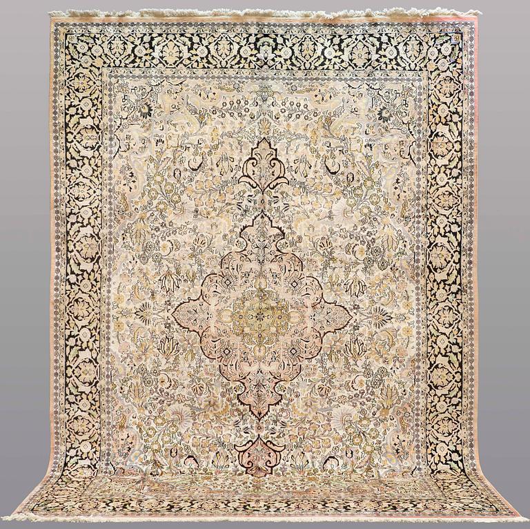 A CARPET, old silk Kashmir, ca 380 x 274 cm.