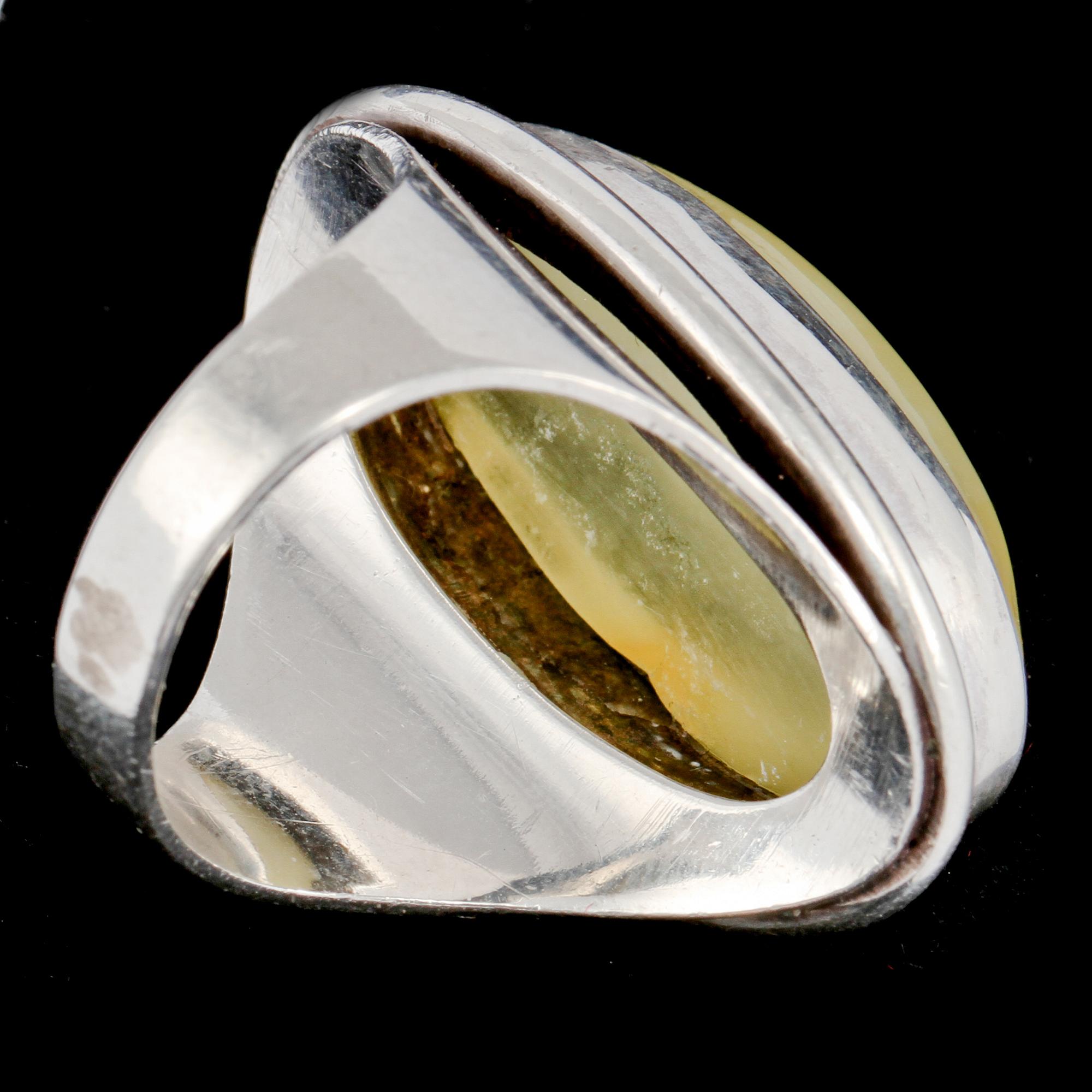 RING, sterlingsilver, troligtvis med gul topas, Herman Siersbol, Danmark, 1900-talets tredje kvartal. Vikt 10 g.