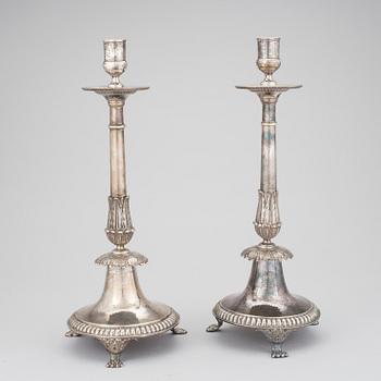 A pair of silver empire candlesticks by Aldolf Zethelius, Stockholm 1821 & 1824. 1284 g.