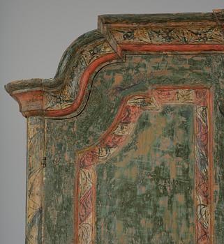 A Swedish polychrome-painted rococo cabinet, late 18th century.