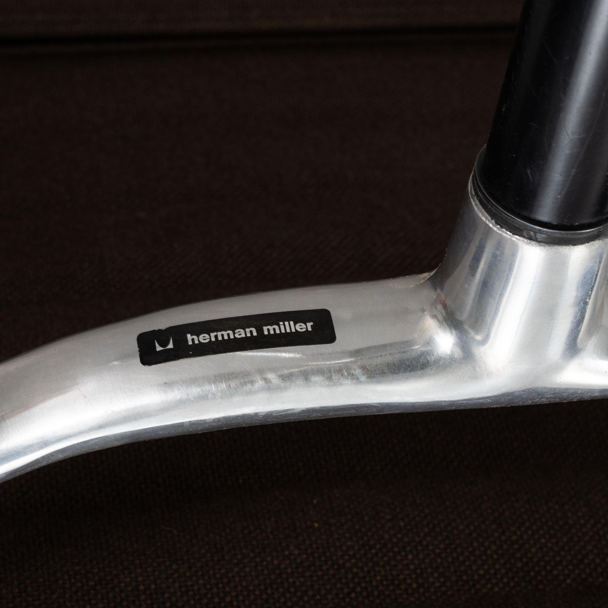 A model EA 108 swivel armchair by Charles and Ray Eames for Herman Miller, designed 1958.