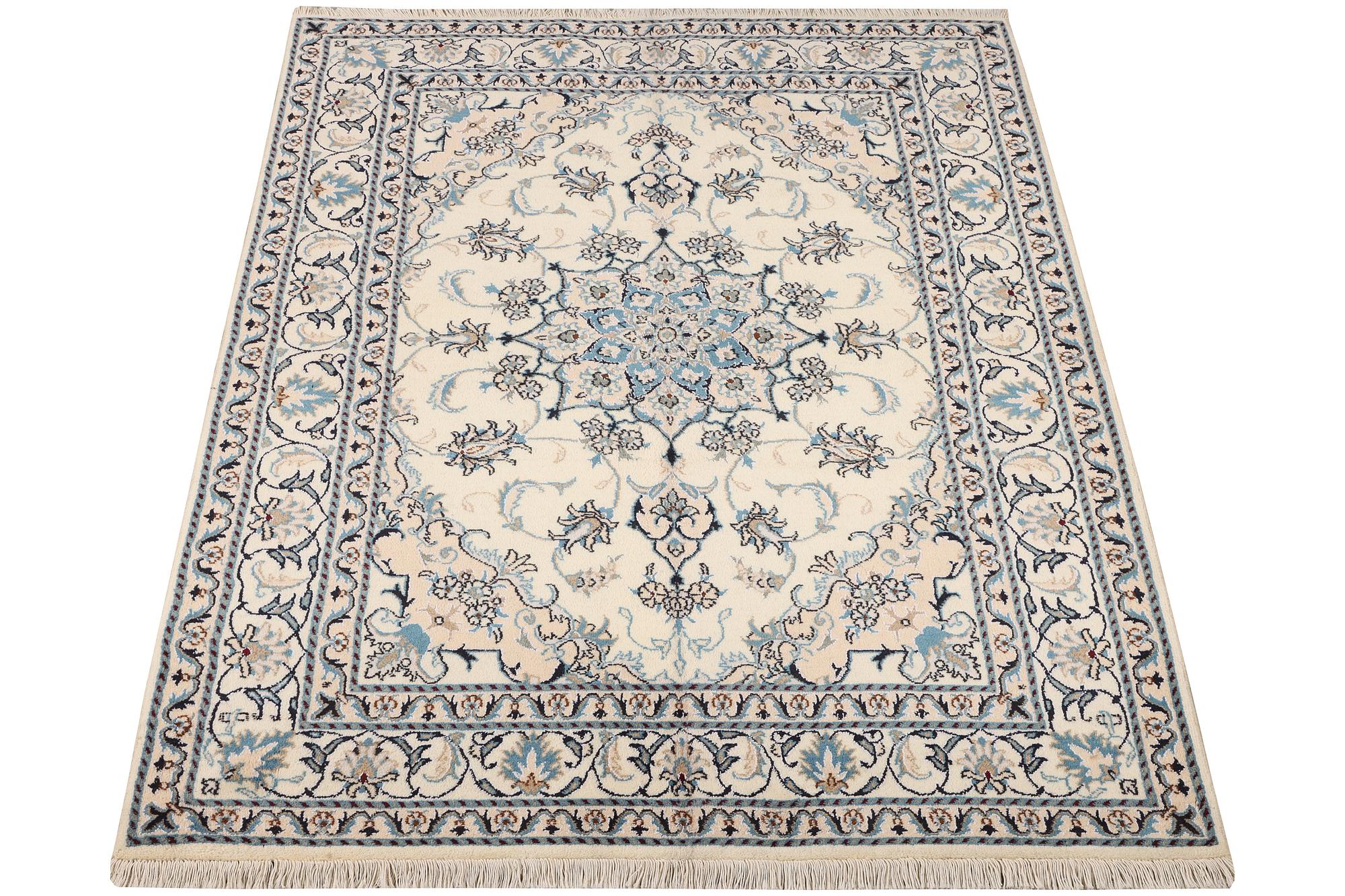 A Nain part silk rug, c. 193 x 148 cm.
