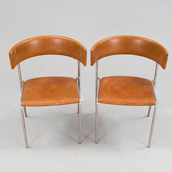 A pair of Erik Karlström leather upholstry chairs, circa 1965.