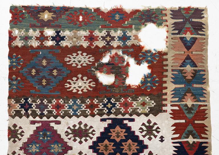 An antique kilim fragment, central Anatolia, c. 238 x 82 cm.