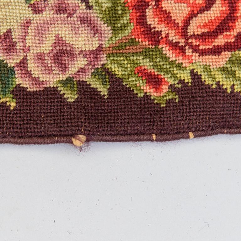 An embroided carpet, 1850-1900. Circa 195 x 130 cm.