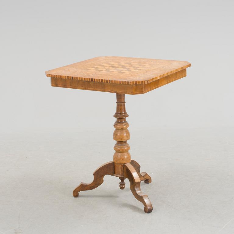 A intarsia table from the late 19th century.