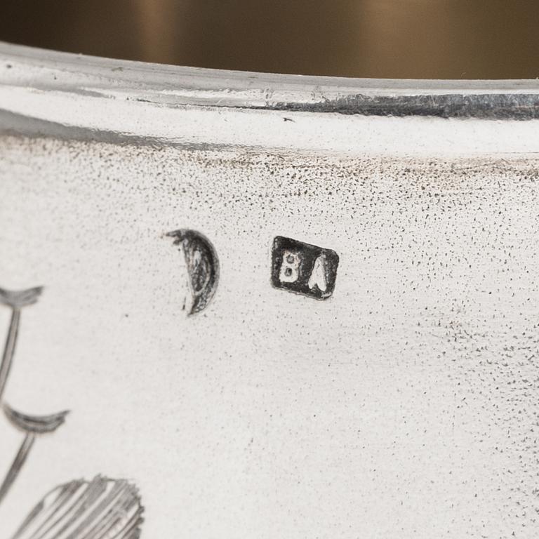 A five-piece Russian parcel-gilt tea set, maker's mark B.A. for Vasili Andrejev or Vasili Akimov, Moscow, 1898-1914.