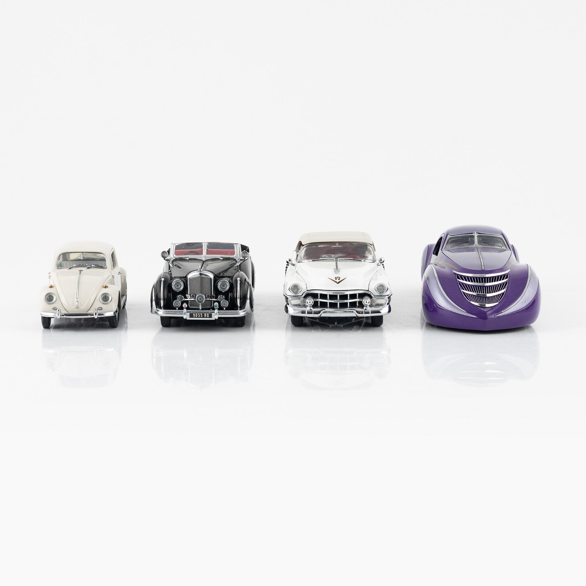 Four die cast model cars and four die cast model motor bikes, Franklin Mint.