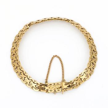 ARMBAND, 18K guld, Thulins Eftr Urhandels, Stockholm, 1936. Vikt ca 13,45 g.